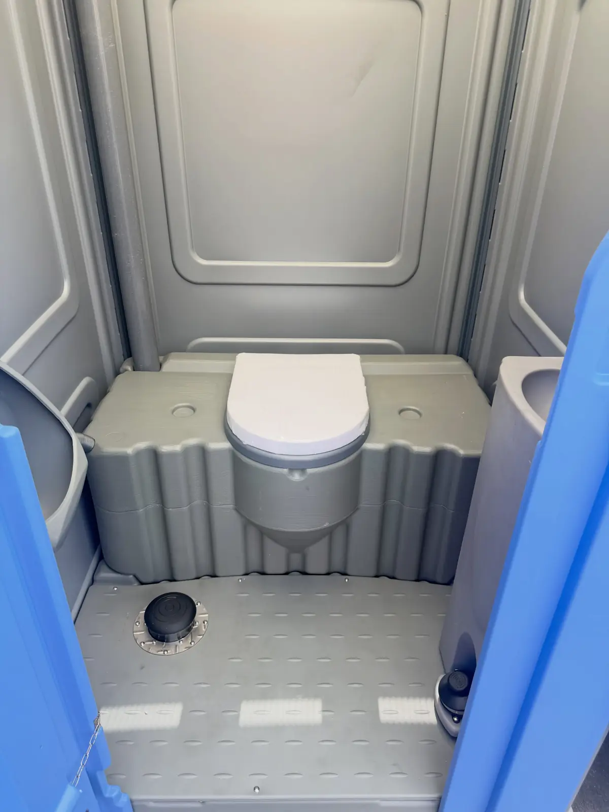 Wide accessible porta potty interior